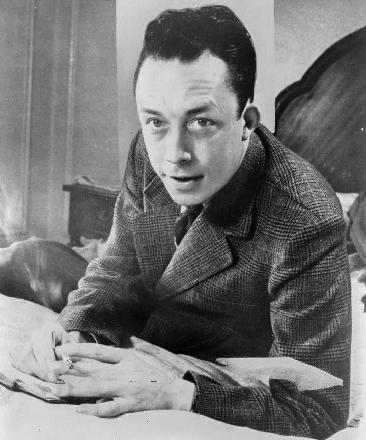 Albert Camus at his desk, photographed by United Press International